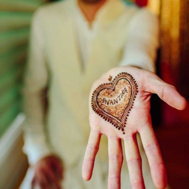 partners-name-inside-a-heart-for-groom-mehndi-design